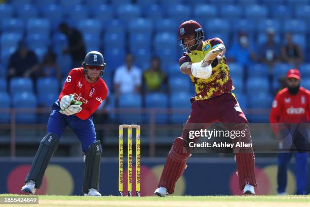 Brandon King of West Indies hits four runs during the 2nd T20 International match between West Indies and England at the National Cricket Stadium on...