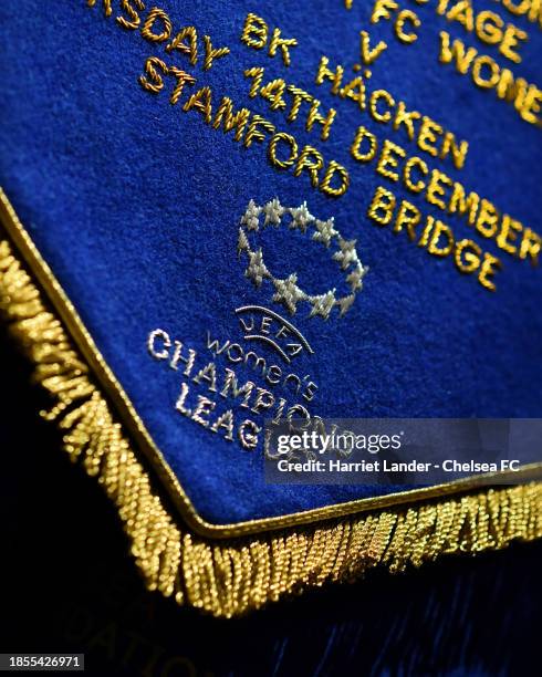 Detailed view of the match pennant is seen inside the dressing room prior to the UEFA Women's Champions League group stage match between Chelsea FC...