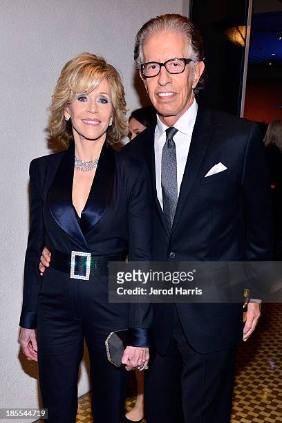 Actress Jane Fonda and produer Richard Perry celebrate with Mot & Chandon at the 17th Annual Hollywood Film Awards Gala at The Beverly Hilton Hotel...