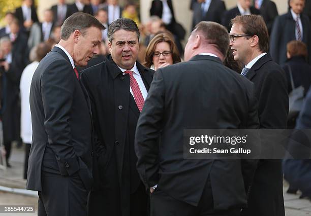 Sigmar Gabriel , Chairman of the German Social Democrats , chats with Hermann Groehe , General Secretary of the German Christian Democrats and...