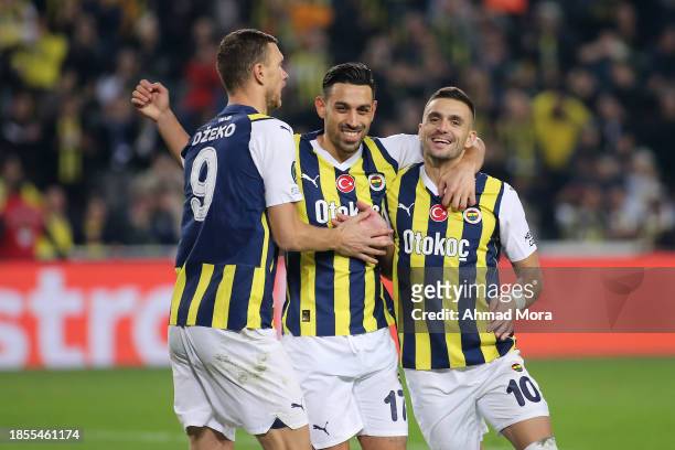 Edin Dzeko of Fenerbahce celebrates with Irfan Can Kahveci and Dusan Tadic of Fenerbahce after scoring their team's third goal after scoring their...