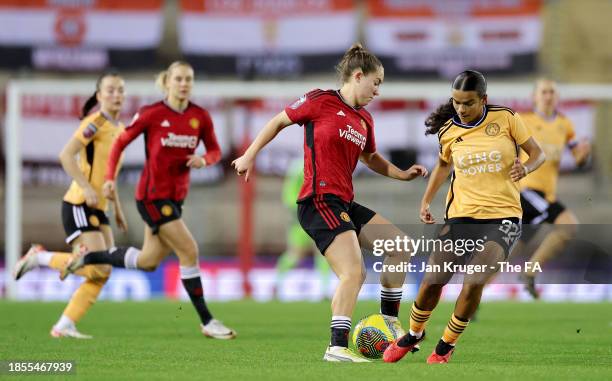 Maya Le Tissier of Manchester United challenges for the ball with Ava Baker of Leicester City during the FA Women's Continental Tyres League Cup...