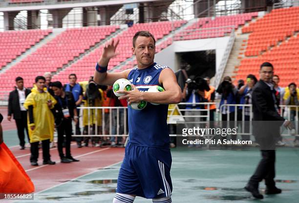 John Terry greets Chelsea football fans during a training session at the Rajamangala Stadium. English Premier League football team Chelsea, who have...
