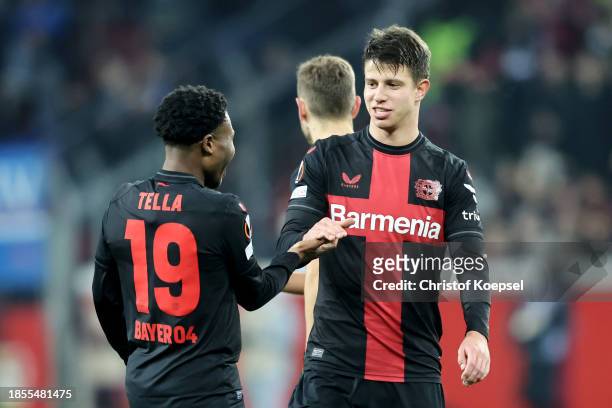 Adam Hlozek celebrates with Nathan Tella after Noah Mbamba of Bayer Leverkusen scored their team's fifth goal during the UEFA Europa League match...