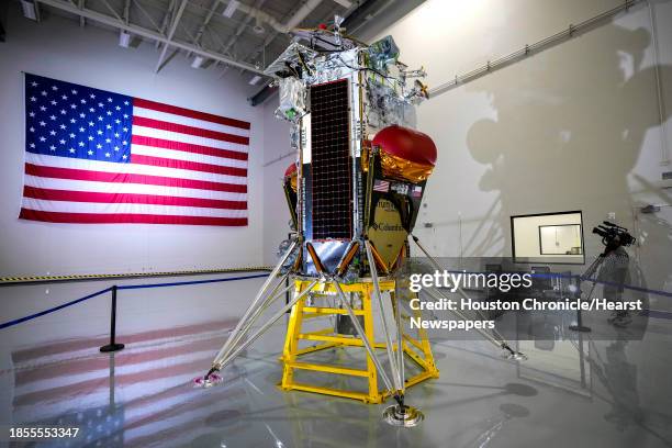 People gather around the Nova-C lunar lander at Intuitive Machines on Monday, Oct. 2 in Houston. The lander was put on display during a media open...