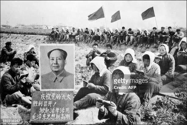 Picture released in 1969 by Chinese official news agency with the caption saying: Chinese peasants gather in May 1969 in a field in Hungching region...