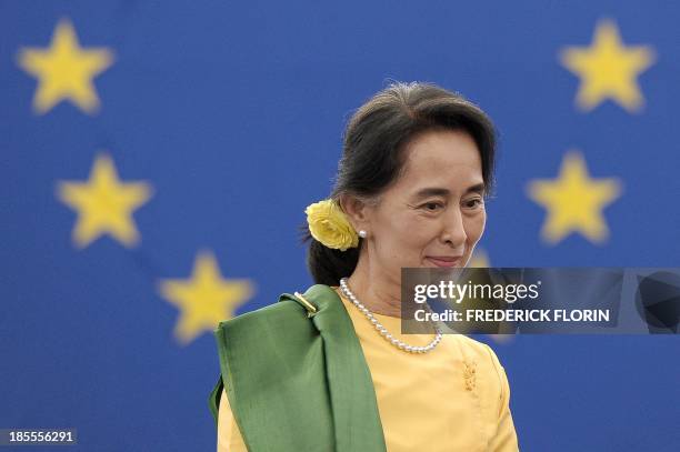 Myanmar opposition leader Aung San Suu Kyi arrives on October 22, 2013 at the European Parliament in Strasbourg, eastern France, to receive the...