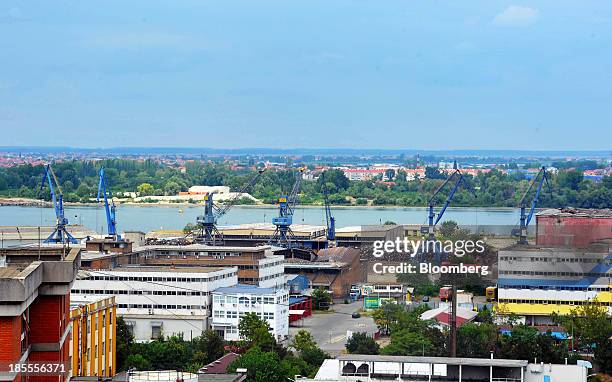 Shipping cranes stand on the dockside at the Port of Belgrade on the River Danube in Belgrade, Serbia, on Monday, Oct. 21, 2013. Serbia's government...