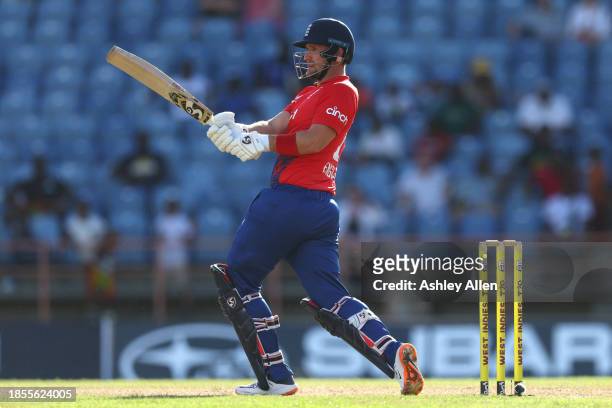 Liam Livingstone of England hits six runs during the 2nd T20 International match between West Indies and England at the National Cricket Stadium on...