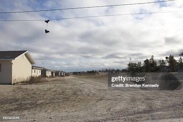 Pair of rollerblades hang from a telephone wire in Easterville, a First Nations reserve in northern Manitoba home to Shelly Lynn Chartier, the...