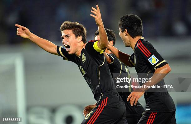 Ulises Rivas of Mexico celebrates scoring his goal during the FIFA U17 group F match between Mexico and Iraq at Khalifa Bin Zayed Stadium on October...