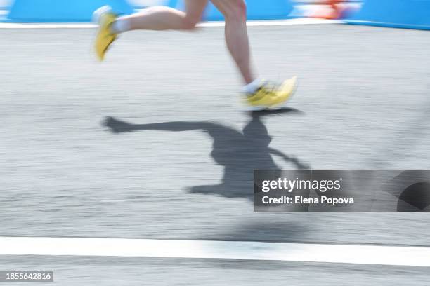 low section amateur running fast in the city, blurred motion abstract sports background - fast motion stock pictures, royalty-free photos & images