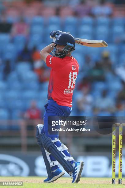 Moeen Ali of England bats during the 2nd T20 International match between West Indies and England at the National Cricket Stadium on December 14, 2023...