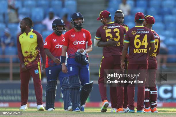 West Indies celebrate victory during the 2nd T20 International match between West Indies and England at the National Cricket Stadium on December 14,...