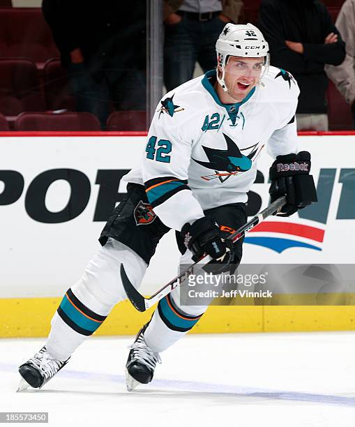 Matt Pelech of the San Jose Sharks skates up ice during their NHL game against the Vancouver Canucks at Rogers Arena on October 10, 2013 in...