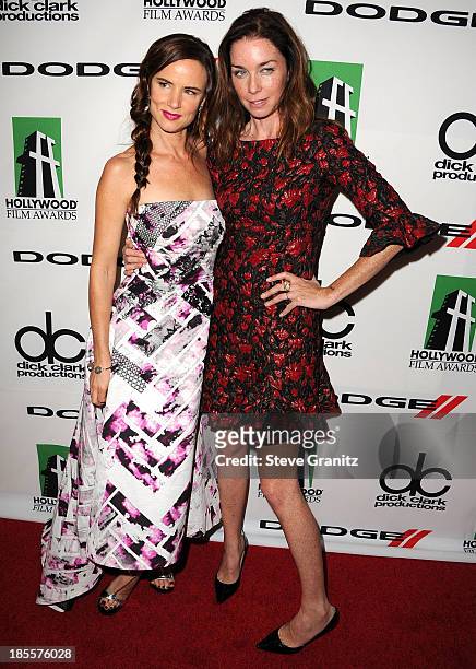 Juliette Lewis and Julianne Nicholson pose at the 17th Annual Hollywood Film Awards at The Beverly Hilton Hotel on October 21, 2013 in Beverly Hills,...
