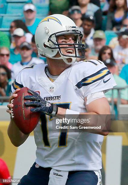 Philip Rivers of the San Diego Chargers attempts a pass during the game against the Jacksonville Jaguars at EverBank Field on October 20, 2013 in...