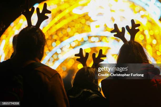 People enjoy the lights and Christmas festivities on December 14, 2023 in Chester, England. Dating from the 15th century Chester’s Winter Watch...