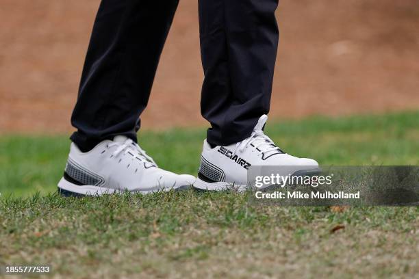 Squarz shoes worn by Sir Nick Faldo of England as he walks to the sixth hole tee box prior to the PNC Championship at The Ritz-Carlton Golf Club on...