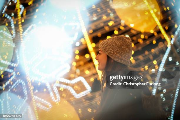 People enjoy the lights and Christmas festivities on December 14, 2023 in Chester, England. Dating from the 15th century Chester’s Winter Watch...