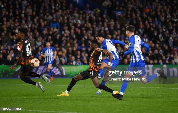 Joao Pedro of Brighton & Hove Albion scores their team's first goal during the UEFA Europa League match between Brighton & Hove Albion v Olympique de...