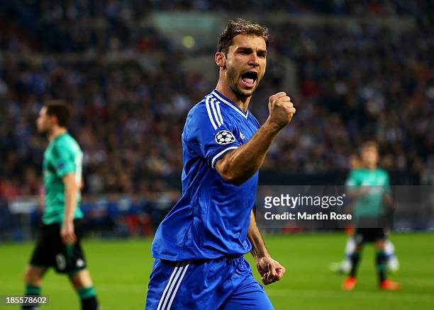 Branislav Ivanovic of Chelsea celebrates as Fernando Torres as he scores their first goal during the UEFA Champions League Group E match between FC...