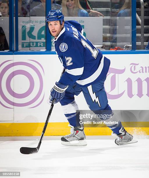 Ryan Malone of the Tampa Bay Lightning skates against the Minnesota Wild at the Tampa Bay Times Forum on October 17, 2013 in Tampa, Florida.