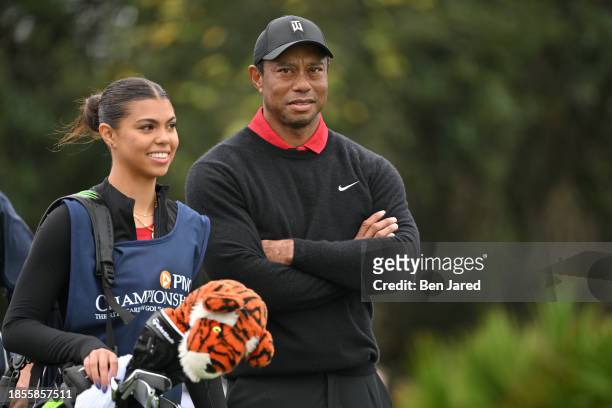 Tiger Woods and Sam Woods stand together on the third tee box during the final round of the PNC Championship at Ritz-Carlton Golf Club on December...