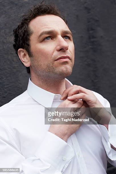Actor Matthew Rhys is photographed for Red Magazine UK on July 14, 2013 in London, England.