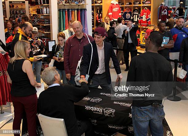 Bobby Orr signs copies of his new book "Orr: My Story" at the NHL Powered by Reebok Store on October 22, 2013 in New York City. Hundreds of fans...