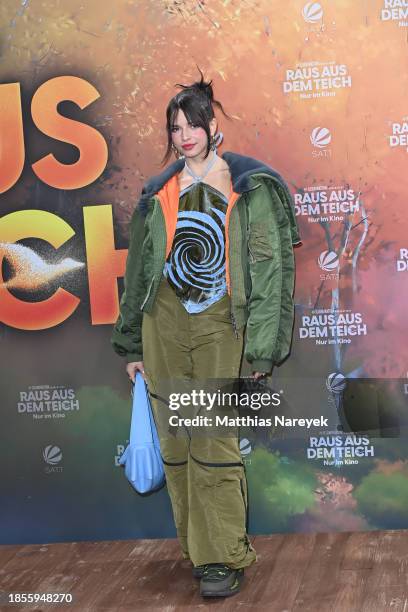 Actress Nina Chuba attends the Berlin premiere of "Raus aus dem Teich" at Zoo Palast on December 17, 2023 in Berlin, Germany.