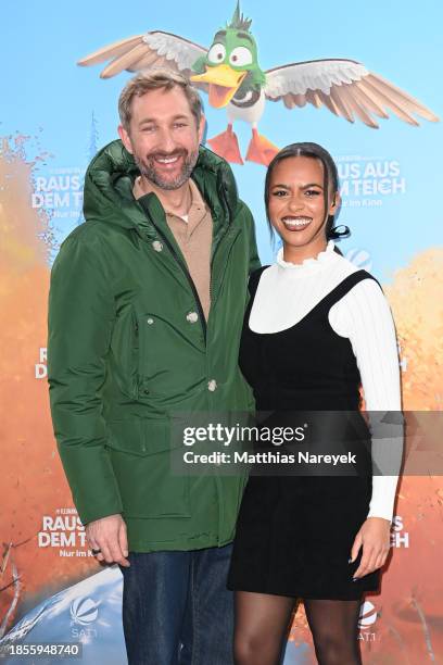 Aminata Belli und Daniel Boschmann attend the Berlin premiere of "Raus aus dem Teich" at Zoo Palast on December 17, 2023 in Berlin, Germany.