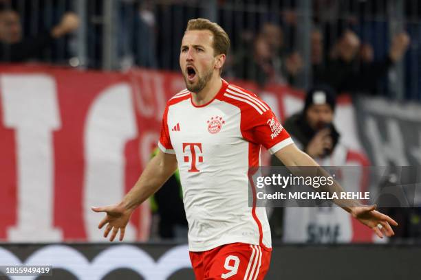 Bayern Munich's English forward Harry Kane celebrates scoring his team's 2:0 during the German first division Bundesliga football match between...