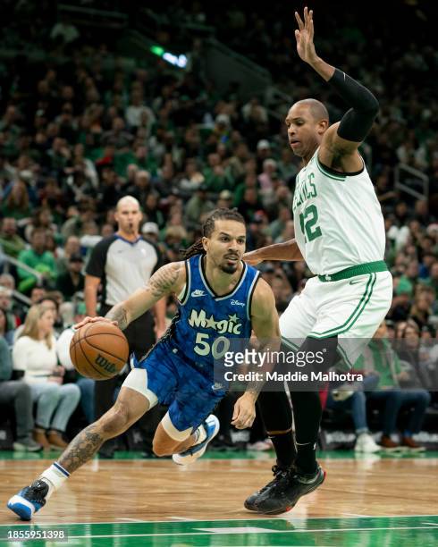 Cole Anthony of the Orlando Magic drives to the basket against Al Horford of the Boston Celtics during the first half at TD Garden on December 17,...