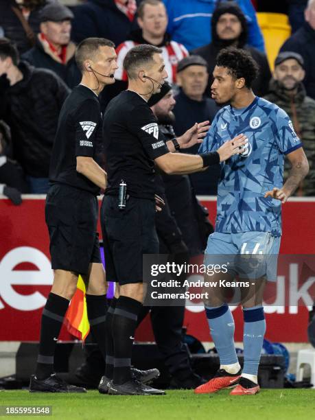 Aston Villa's Boubacar Kamara protests after receiving a red card from referee David Coote during the Premier League match between Brentford FC and...