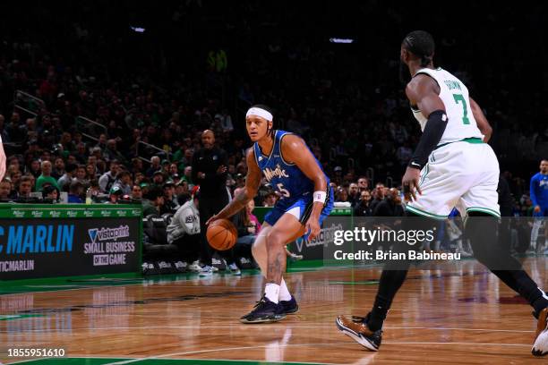 Paolo Banchero of the Orlando Magic handles the ball during the game against the Boston Celtics on December 17, 2023 at the TD Garden in Boston,...