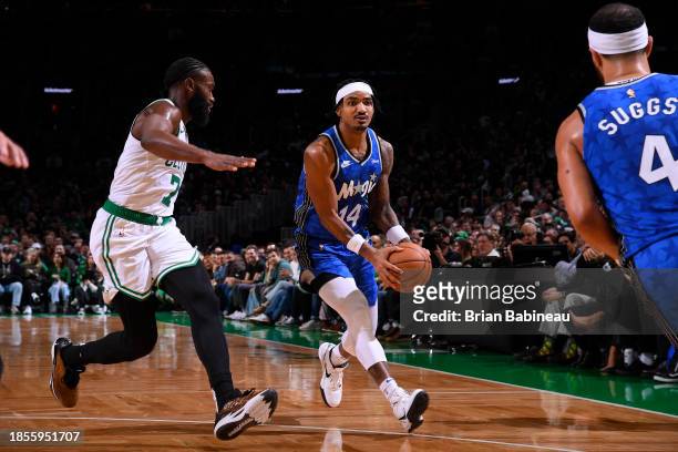 Gary Harris of the Orlando Magic looks to pass the ball to Jalen Suggs during the game against the Boston Celtics on December 17, 2023 at the TD...
