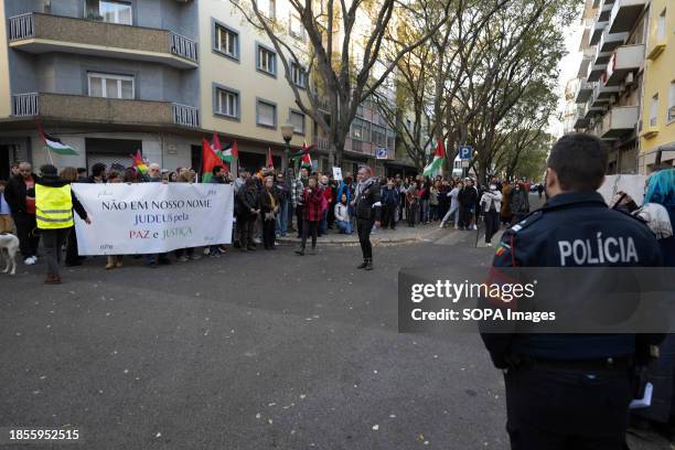 An activist addresses a group of protesters gathered near the Israeli embassy. The protest actions were organized by PUSP - Plataforma Unitária de...