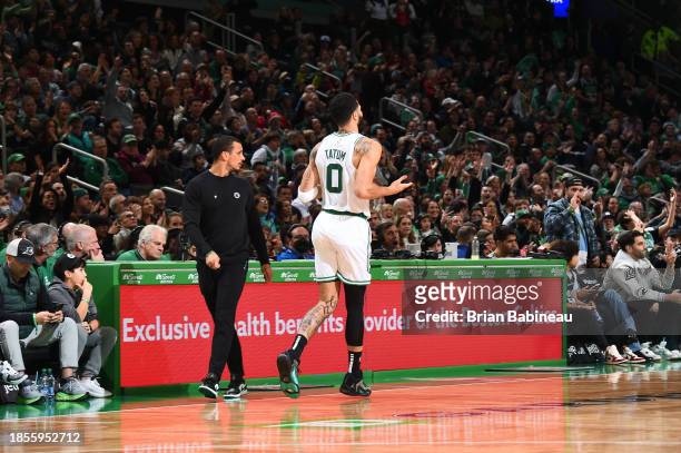 Jayson Tatum of the Boston Celtics celebrates a three point basket during the game against the Orlando Magic on December 17, 2023 at the TD Garden in...