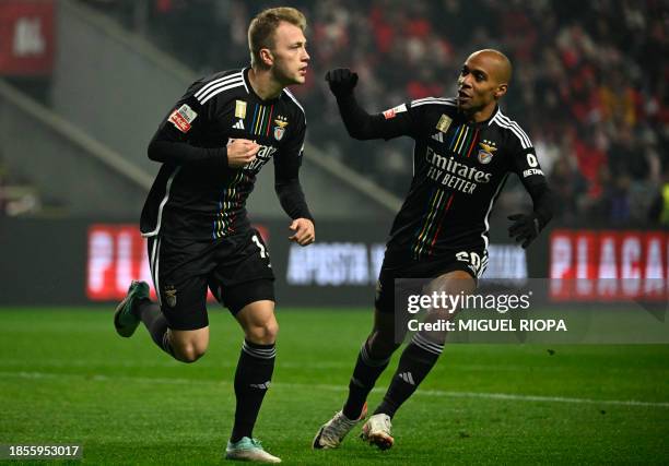 Benfica's Danish forward Casper Tengstedt celebrates scoring the opening goal with Benfica's Portuguese midfielder Joao Mario during the Portuguese...
