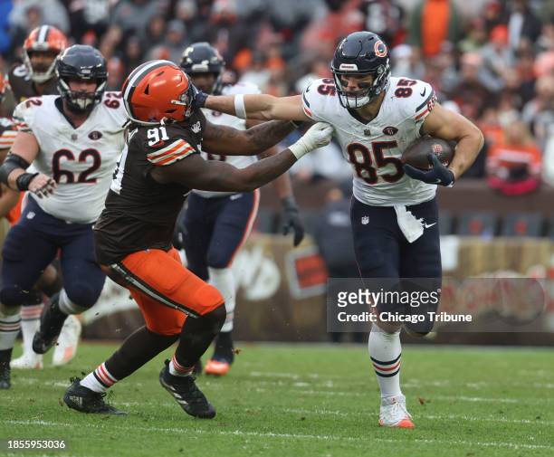Chicago Bears tight end Cole Kmet makes a reception against Cleveland Browns defensive end Alex Wright in the second quarter Sunday, Dec. 17 at...