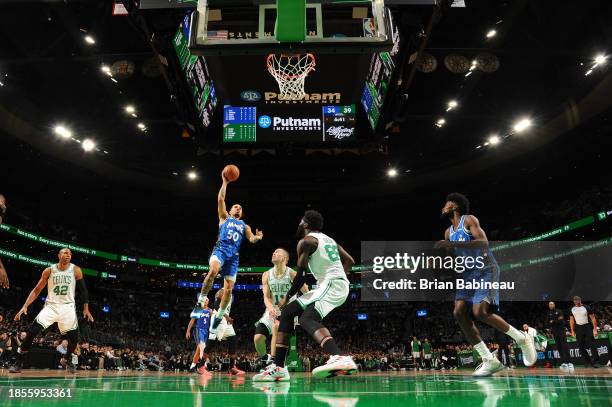 Cole Anthony of the Orlando Magic shoots the ball during the game against the Boston Celtics on December 17, 2023 at the TD Garden in Boston,...