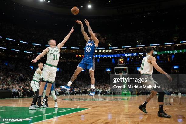 Cole Anthony of the Orlando Magic shoots the ball against Payton Pritchard of the Boston Celtics during the first half at TD Garden on December 17,...