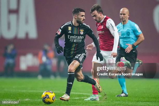 André Horta of Braga chases Rafa Silva of Benfica during the Liga Portugal Bwin match between Sporting Braga and SL Benfica at Estadio Municipal de...