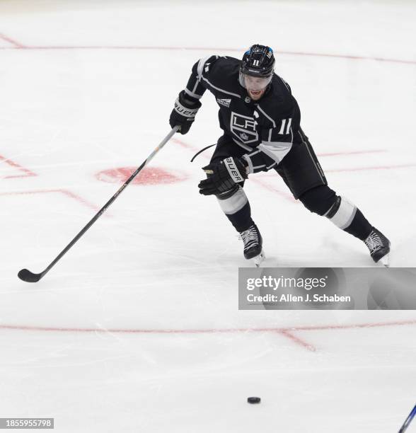 Los Angeles, CA Anze Kopitar, #11, chases after the puck against the Winnipeg Jets at Crypto.com Arena in Los Angeles Wednesday, Dec. 13, 2023.