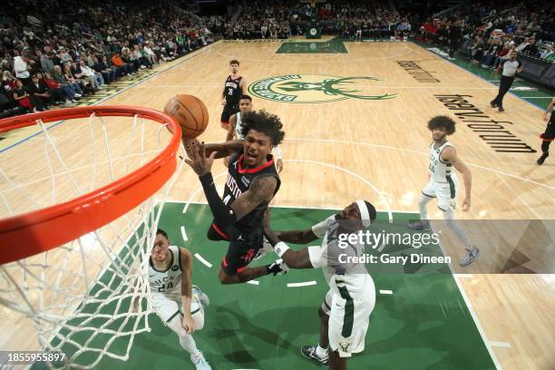 Jalen Green of the Houston Rockets drives to the basket during the game against the Milwaukee Bucks on December 17, 2023 at the Fiserv Forum Center...