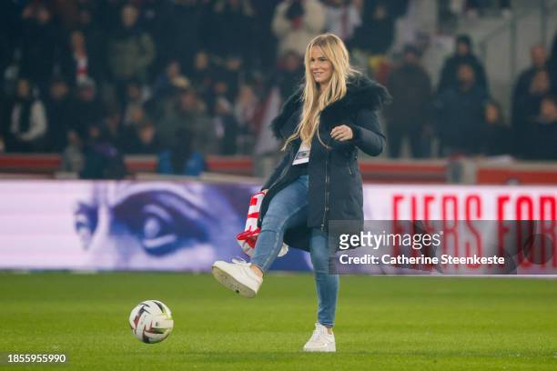 Amandine Henry, French professional footballer, who plays as a defensive midfielder for French club Lille OSC give the game ball before the Ligue 1...