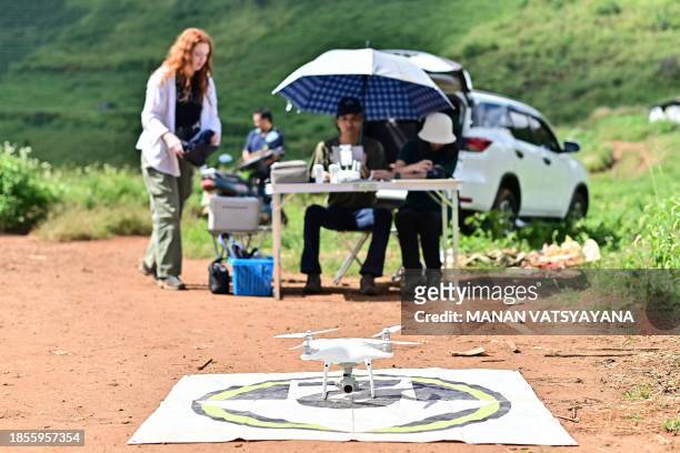 This picture taken on November 22, 2023 shows a drone to be used by Chiang Mai University's Forest Restoration Research Unit field research officer...