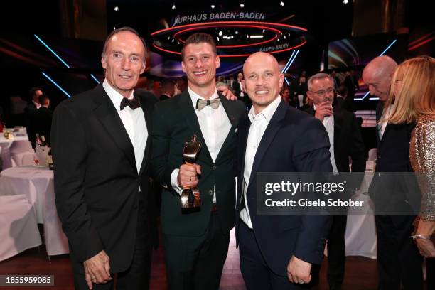 Eberhard Gienger, winner and world champion gymnast Lukas Dauser and gymnast/ gold medalist Fabian Hambüchen during the "Sportler des Jahres" Award...