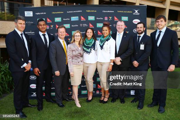 Bill Pulver, NSW Minister for Sport and Recreation Gabrielle Upton and New South Wales Legislative Assembly member Stephen Bromhead pose with members...